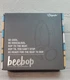 Origaudio Beebop Branded  Wired or Wireless Headphones Black with cheer logo on.